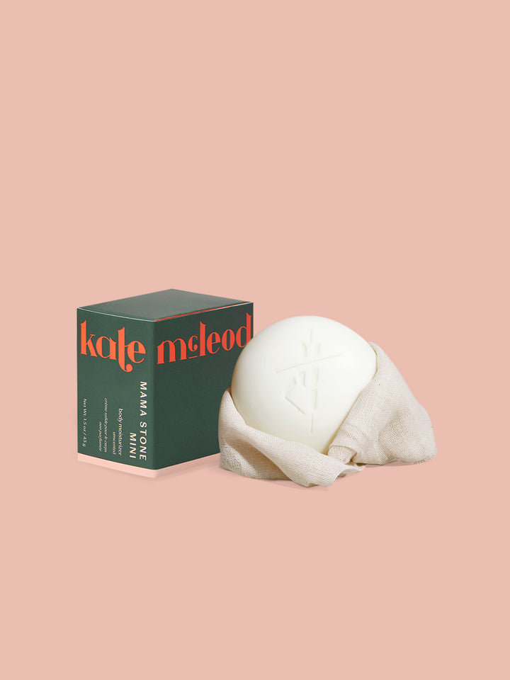 Kate McLeod packaging of the Mama Stone on a pink background.