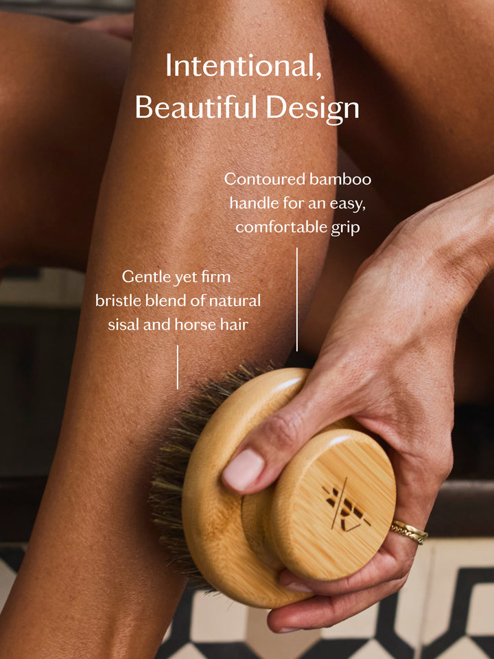 Person using the dry brush on their leg with text about design and materials.