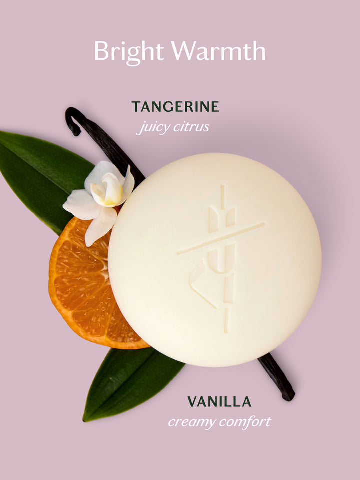 Kate McLeod Tangerine & Vanilla lotion bar with ingredients. Tangerine for juicy citrus and vanilla for creamy comfort.