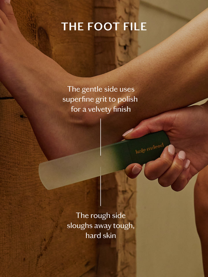 Person using a foot file on their leg with text explaining its use.