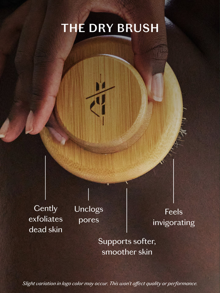 Wooden dry brush with text describing its benefits on a brown background