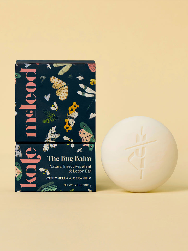 Bug Balm Body Stone lotion bar with packaging against light yellow background.
