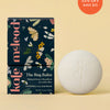 Bug Balm Body Stone lotion bar with packaging against light yellow background.