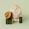 The Gift Bag pictured with Dry Brush, Recovery Stone, and Everywhere Stick to demonstrate size. These products would all fit into the bag.