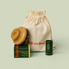 The Gift Bag pictured with Dry Brush, Recovery Stone, and Everywhere Stick to demonstrate size. These products would all fit into the bag.