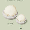 Oatmeal Full-Size Travel Case with full-size Body Stone inside and ivory Mini Travel Case with mini Body Stone inside, sitting side-by-side.