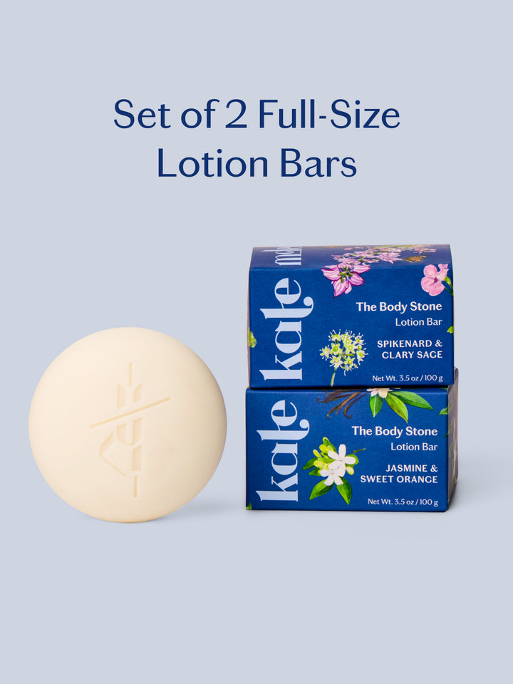 Set of 2 full-size lotion bars with their packaging on a light blue background
