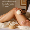 Person applying a Body Stone to their leg with text "Clinically proven to boost moisture levels for up to 72 hours".