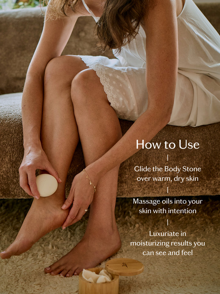 Person using a Body Stone with text on how to use it