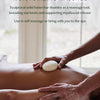 Moisturizing massage with the Recovery Stone.