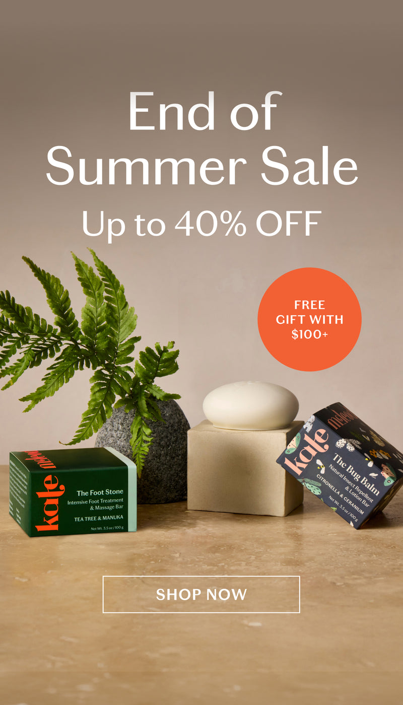 The foot stone, body stone and bug balm styles on a stone surface alongside a fern with a "Up to 40% Off" banner in the top right corner.