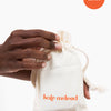 Image of Kate McLeod Freshly Batched limited edition. This solid moisturizer comes simply packaged in a muslin drawstring bag.